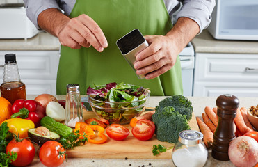 Chef man cooking in the kitchen.