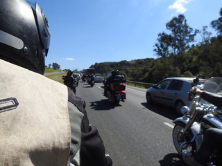 Custom bike motorcycle group traveling on the road, motorcyclists lifestyle roadtrip