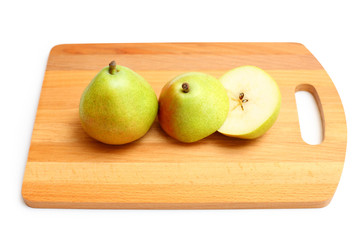 Anjou pear on a wooden board on a white background