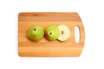 Anjou pear on a wooden board on a white background