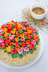 Buttercream flower tulip cake , beautiful festive cake decorated with colorful cream flowers