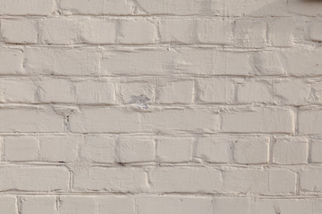 old white and gray brick wall