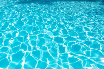 Blue water surface and ripple wave in pool