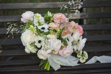 Beautiful wedding rustic bouquet with white roses.