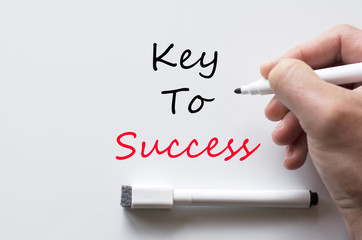 Key to success written on whiteboard