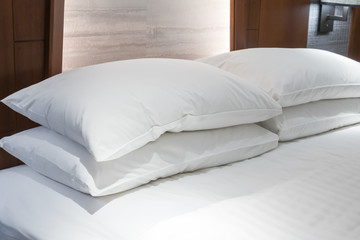 Fototapeta na wymiar Comfortable pillows and bed .