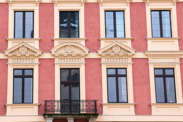 Fototapeta premium Vintage design windows on the facade of the old house.