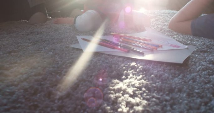 kids playing on floor of modern apartment