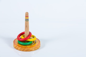 Quoits, wooden toy isolated on white background