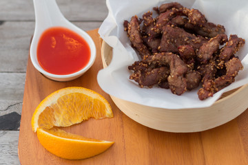 Deep fried pork that serve with ketchup