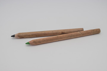 colored pencils on the table. Isolate