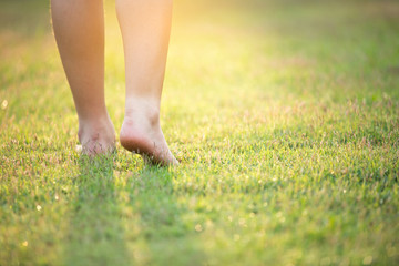 barefoot on the green grass