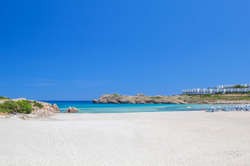 Arenal de Son Saura beach in summer sunny day at Menorca island.