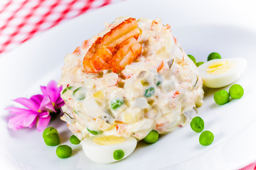 Salad Olivier on white plate