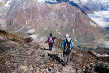 Cercles muraux Manaslu Trekker on the way to the valley covered with cloud on Manaslu circuit trek in Nepal