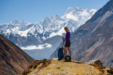 Foto auf Acrylglas Manaslu Trekker rests on Manaslu circuit trek in Nepal