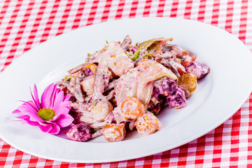 Salad with baked vegetables and tongue