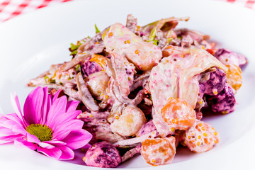 Salad with baked vegetables and tongue