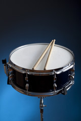 Fototapeta na wymiar Snare drum with drum sticks