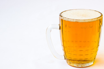 Glass mug with beer on a white