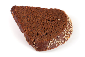 one slice of black bread with sesame seeds isolated on white background