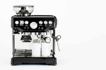 Isolated black manual coffee maker with coffee mugs on a white background, front view