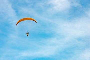 man ride Paramotor flying in the sky