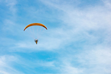 man ride Paramotor flying in the sky