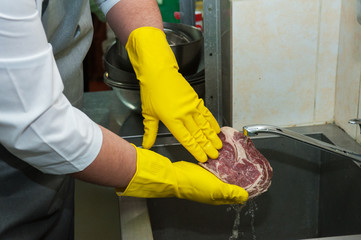 washing and cleaning meat