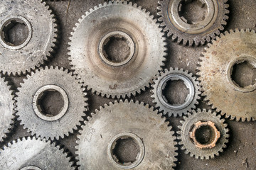 Old rusty gears on the floor