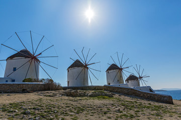 Fototapeta na wymiar Old windmills of island Mykonos