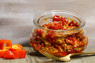 A jar of red chili pickle