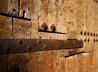 Ancient wooden door in Valencia Torres de Serranos