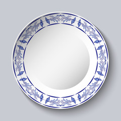 Round blue floral frame. Styling elements based on Chinese or Russian porcelain painting. Ornament shown in a ceramic dish.