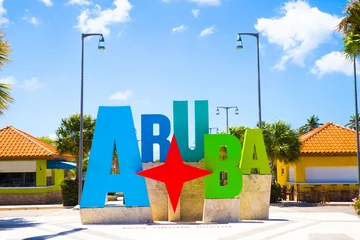 Fotobehang Aruba toerisme kleurrijk welkom teken © littleny