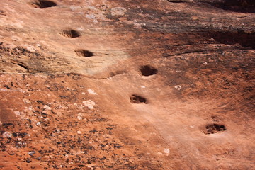 Footholds cut into slickrock along a trail in Canyonlands National Park, Utah.  