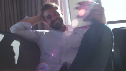 man using technlogy at modern apartment