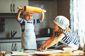 happy family funny kids bake cookies in kitchen