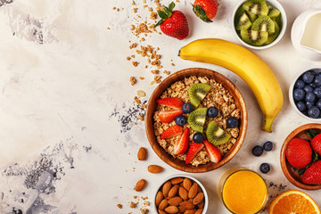Healthy breakfast - bowl of muesli, berries and fruit