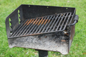 Rusty BBQ grill grates at park