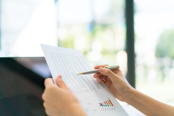 Business people using laptop and Financial charts at meeting office   .