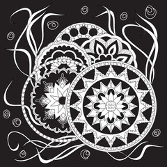 black print with white mandalas and herb