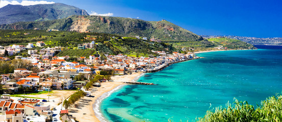 Greek holidays - beautiful Kalyves village with turquoise sea. Crete island - obrazy, fototapety, plakaty