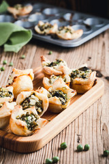 Homemade spinach and feta cheese puff pastry cups