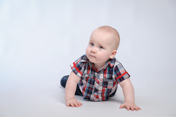 Baby boy in plaid shirt