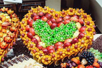 heart-shaped frame made of fruit