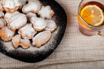 Homemade cookies with condensed milk stuffed with nuts