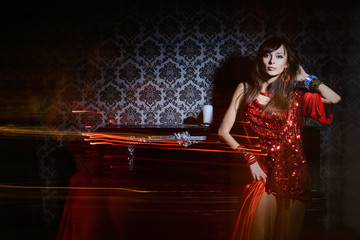 woman in red waving dress in interior