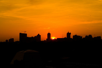 Fototapeta premium Sun rising over ig city