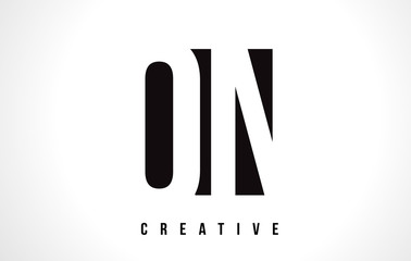 QN Q N White Letter Logo Design with Black Square.